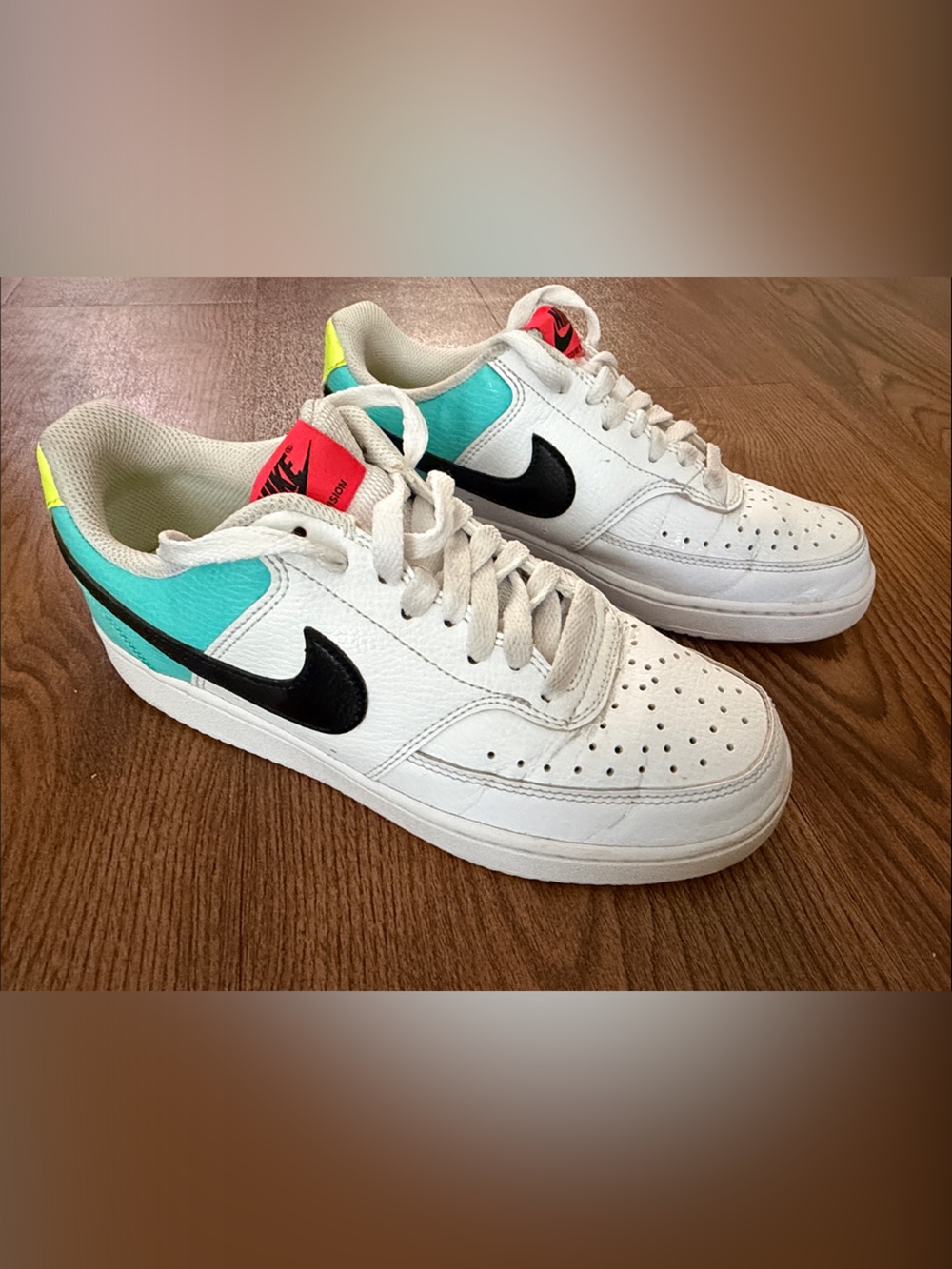 Nike Low-Top Sneakers in White with Black Swoosh and Teal Accents
